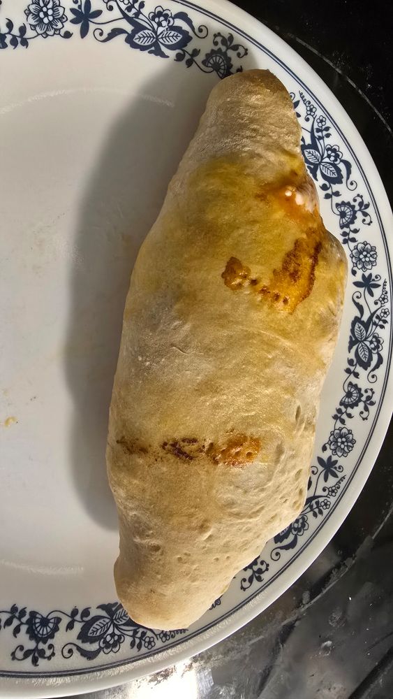 Homemade pepperoni calzone