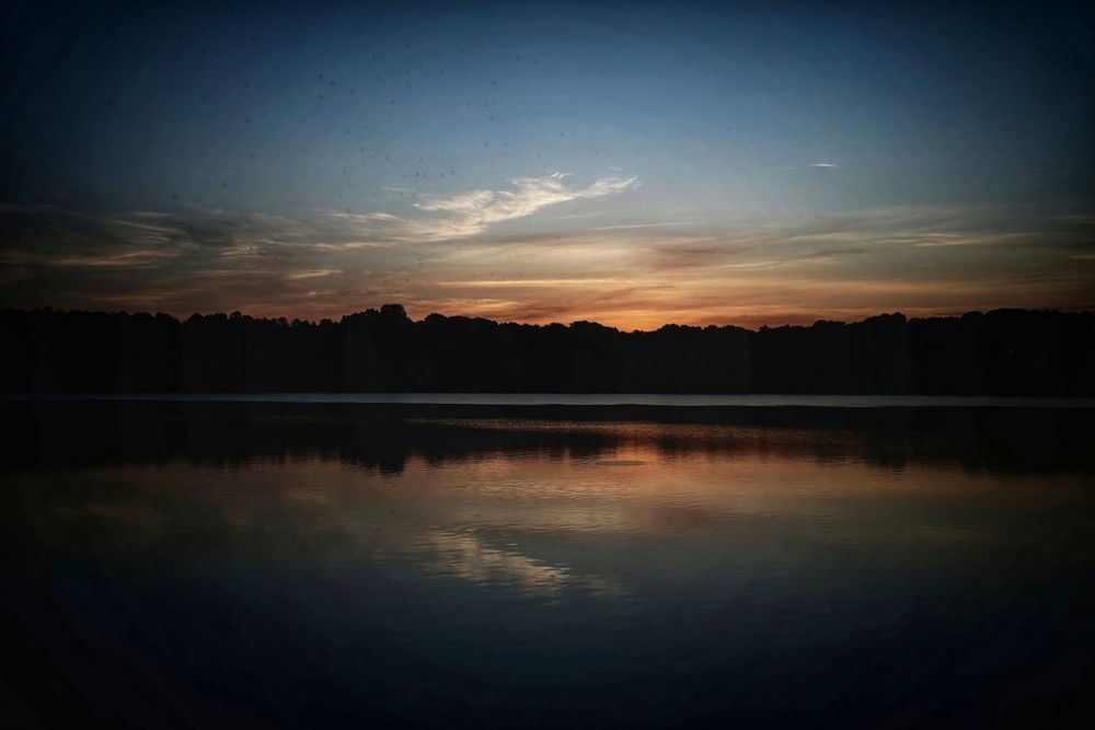 sunrise reflected in lake (from several years ago)