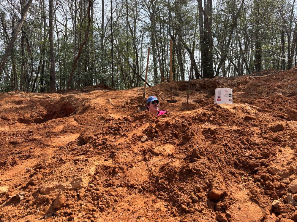 me standing in a 5 foot hole 