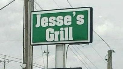 A sign for “Jesse’s Grill.”