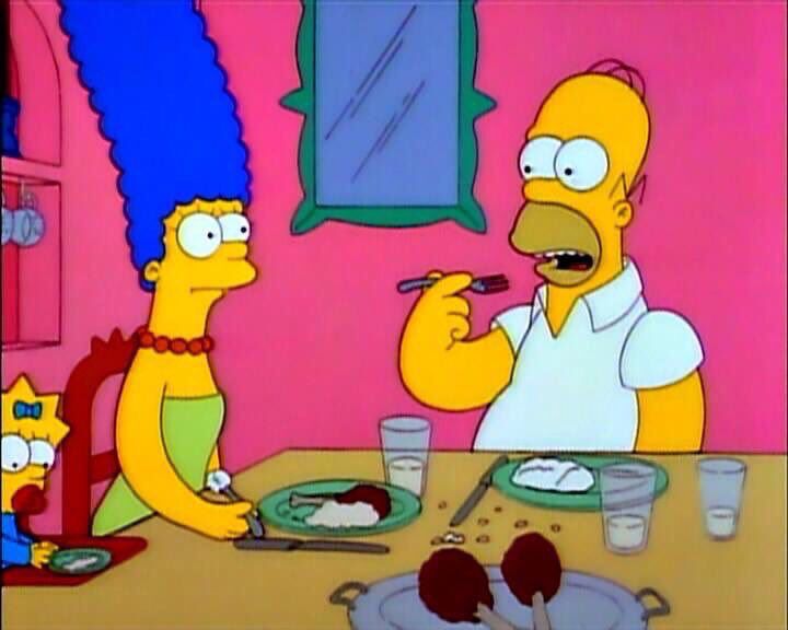 Homer simpsom speaking the line from the text