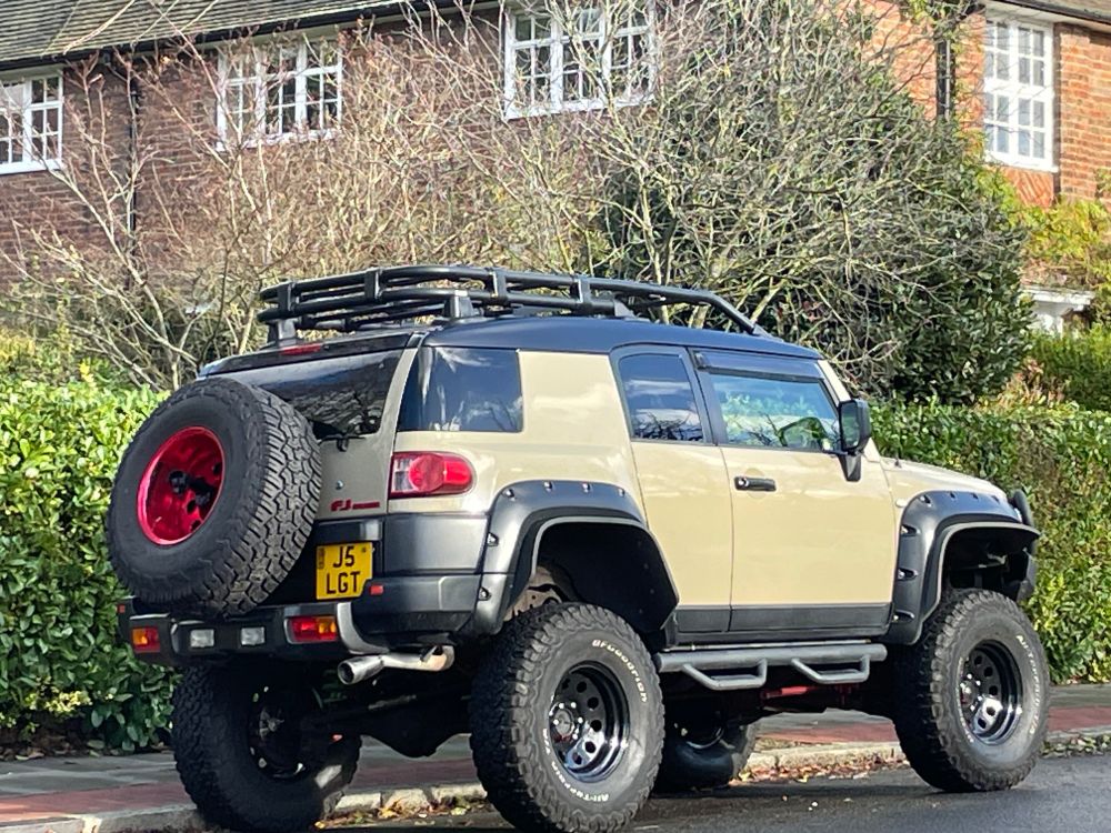 Large hummer-type vehicle in a north west London suburb. Reg no J5 LGT