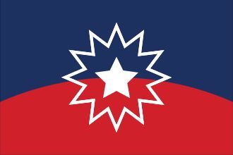 The Juneteenth flag, a blue over red bicolor with the dividing line bowed downwards with horizontal symmetry and centered over all a large white five-pointed regular star upright, within a white outline of a 12-pointed regular star upright.