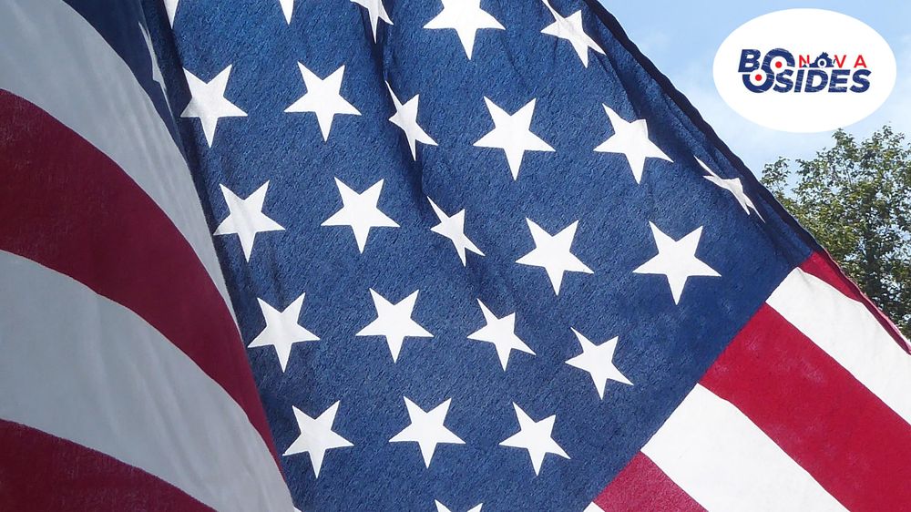 U.S. flag with a small oval BSides NoVA logo in the corner.