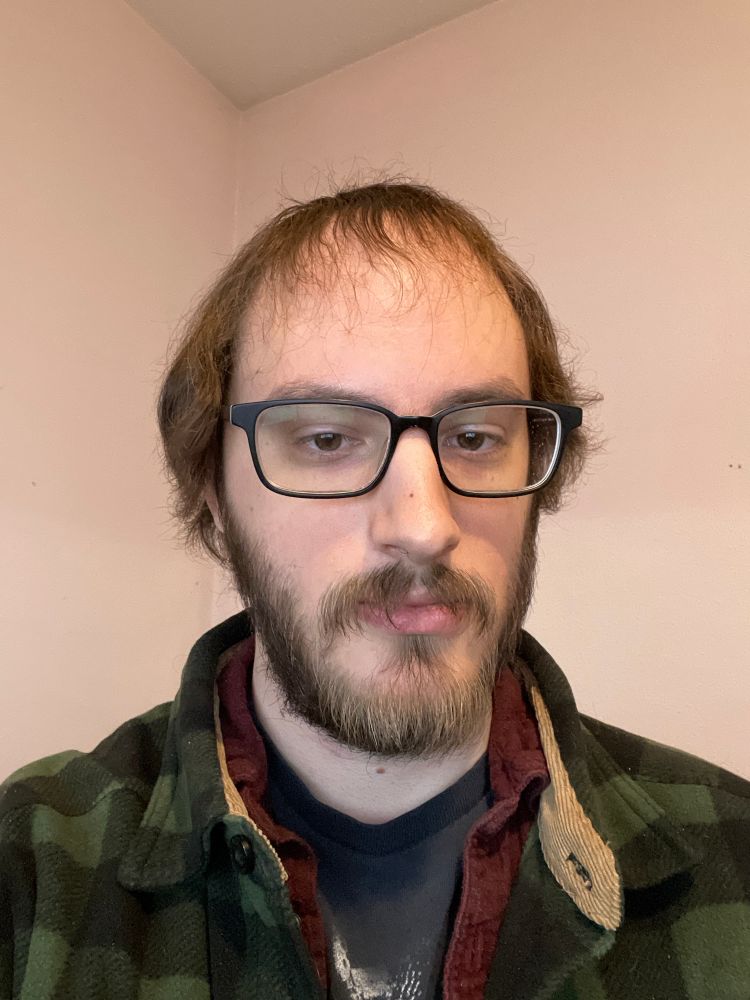 Pre-transition me. My hair was short, I had a beard, and my eyes expressed only the apathy and misery of the dead. 