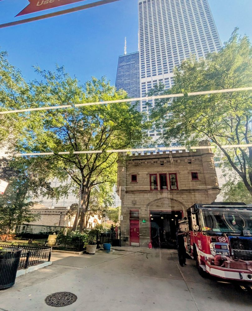 a picture of the fire station near water tower, the water tower place and the Hancock building