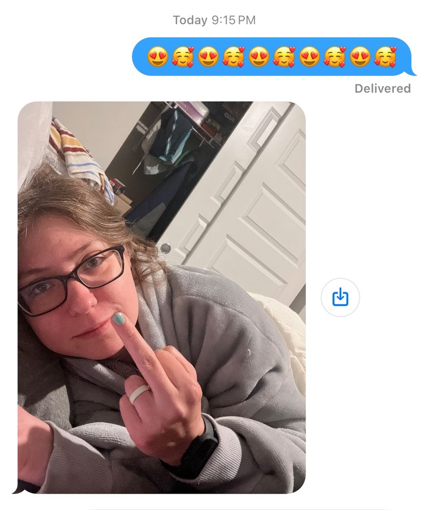 Screenshot of a phone conversation. I sent my finance a bunch of heart eye emojis and he responded with a picture of me flipping the camera off