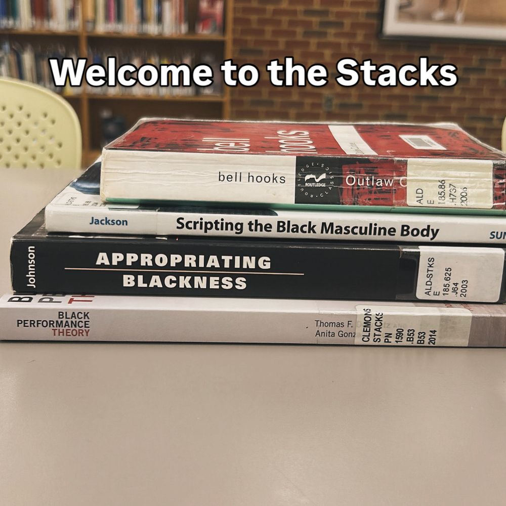 Pictured is a stack of four books. From top to bottom, the titles are as follows:
1. Outlaw Culture by Bell Hooks
2. Scripting the Black Masculine Body by Ronald L. Jackson III
3. Appropriating Blackness by E. Patrick Johnson
4. Black Performance Theory by Thomas DeFrantz and Anita Gonzalez

Welcome to Mondays in the Stacks