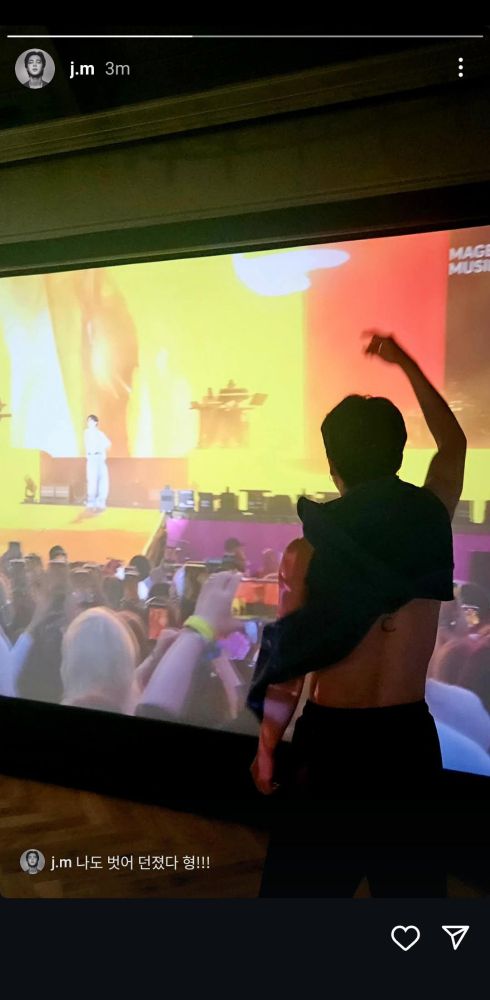 Ig posting from Jimin of him in front of a massive tv shirt half off watching his bandmate j-hope in Berlin ar Lollapalooza 