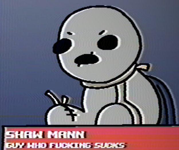 The 'straw man' item from The Binding of Isaac, sitting on a chair.
the caption depicts him as a 'guy who fucking sucks'