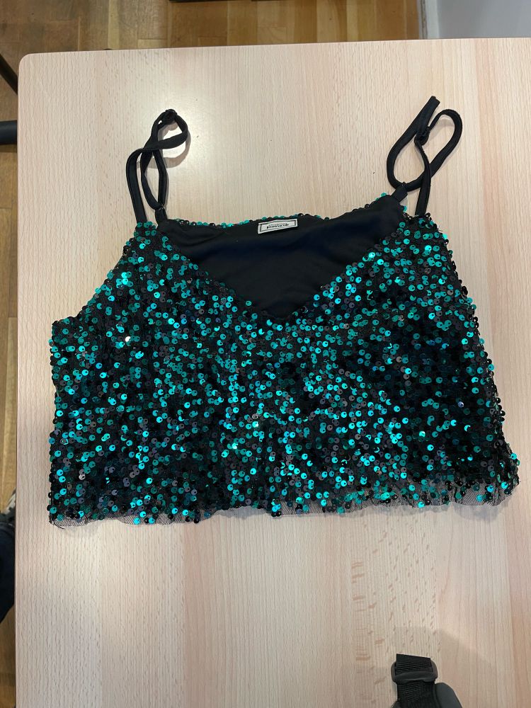 Croctop disco de couleur turquoise.
