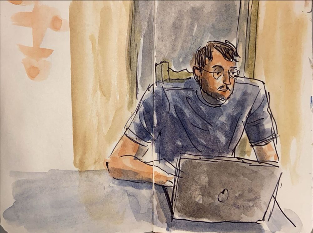 A loose watercolor sketch of a young man with large shoulders, using a laptop on table