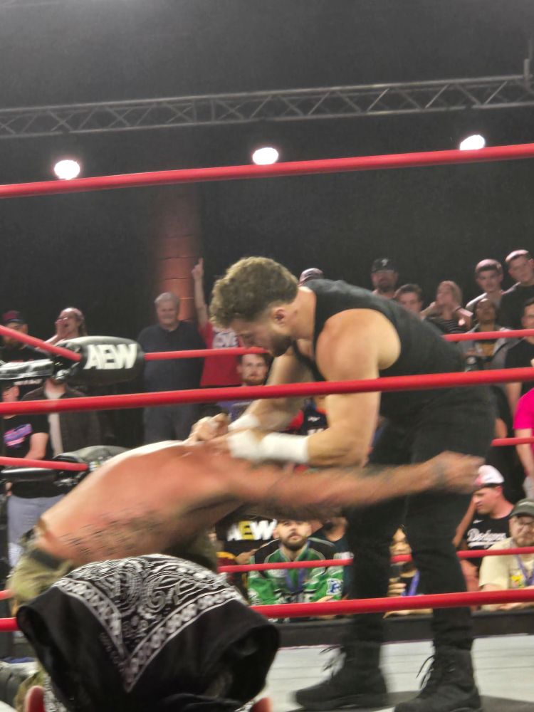 Mjf in his black murder tank top fucking up mark briscoe's shit and brawling with him