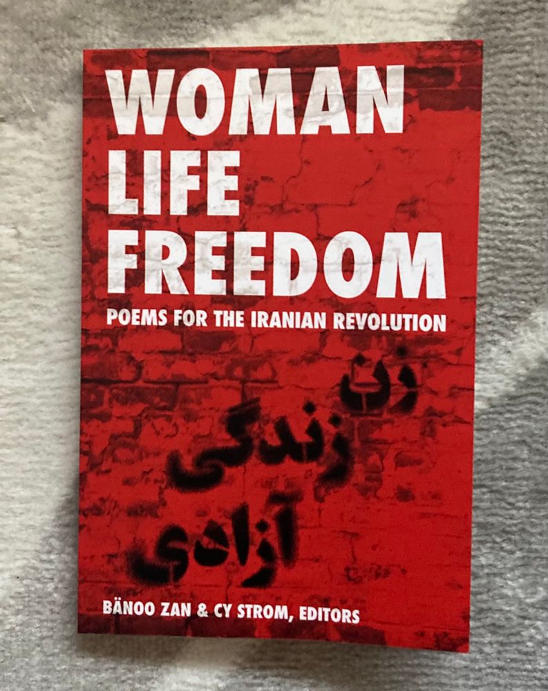 Vibrant red cover image of the poetry anthology Woman Life Freedom: Poems for the Iranian Revolution