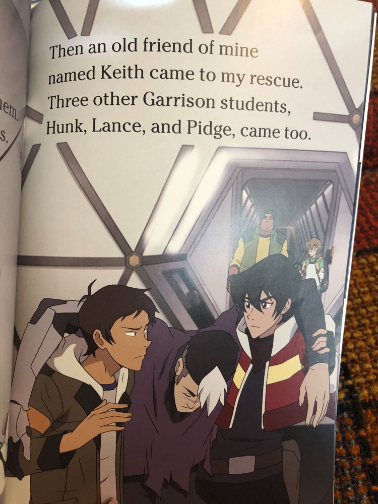 A page of "Shiro's Story", a young-readers book for "Voltron: Legendary Defender". The text reads: "Then an old friend of mine named Keith came to my rescue." The illustration shows Keith and Lance holding up an unconscious Shiro and glaring at one another.