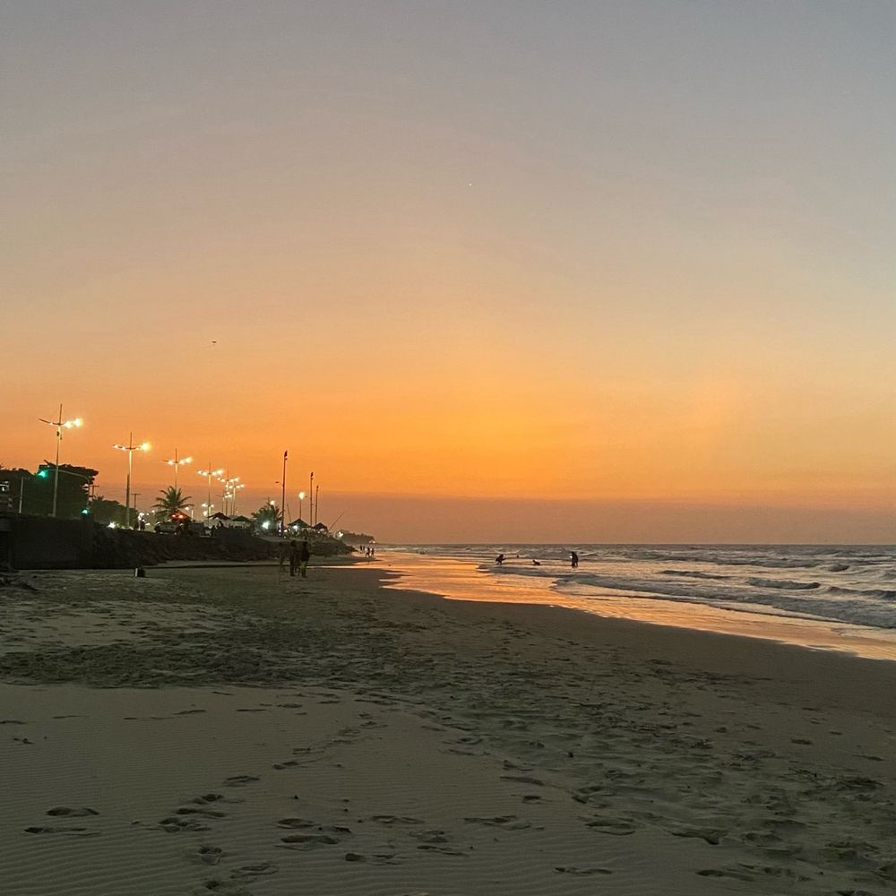 Por do sol na beira da praia