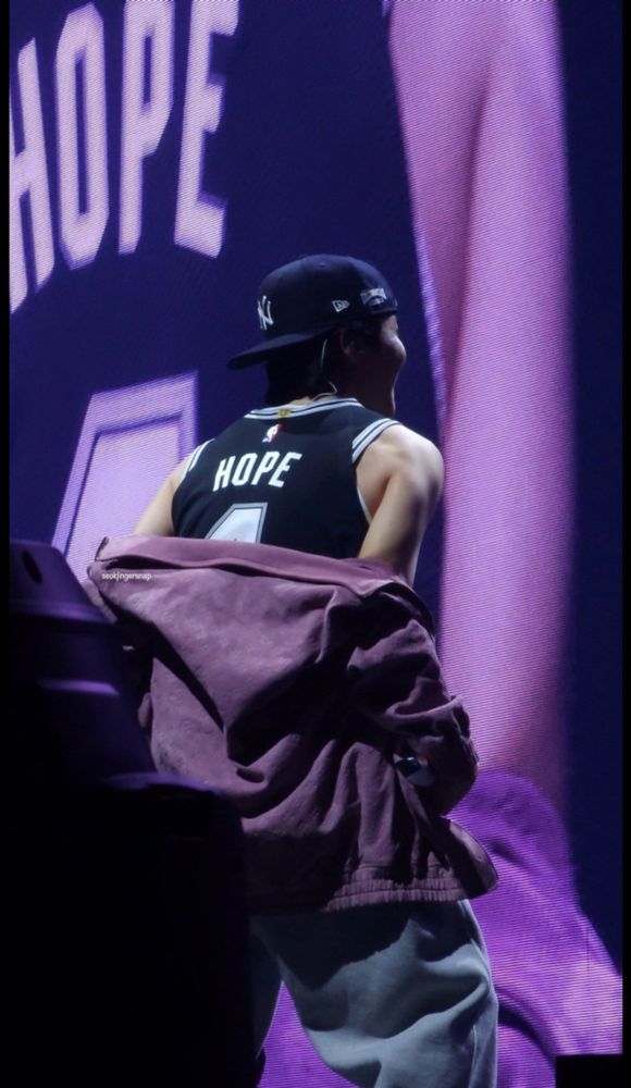 J-Hope wearing a basketball jersey at his sound check in San Antonio.