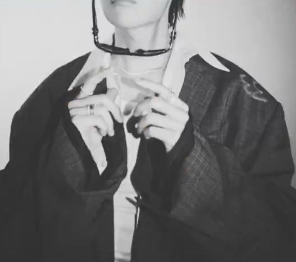 Front and back of j-hope! Photos are black and white and he’s wearing balenciaga.