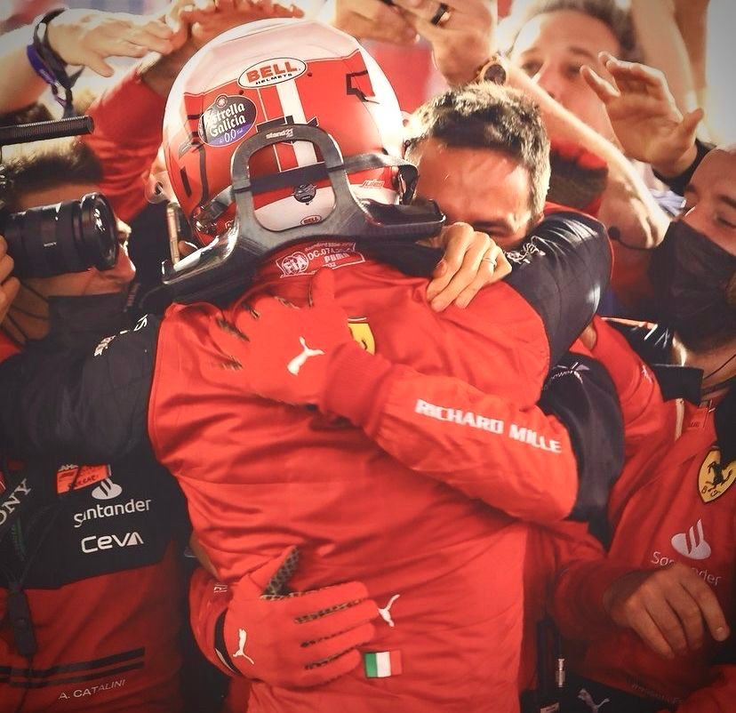 Charles’ team hugging him