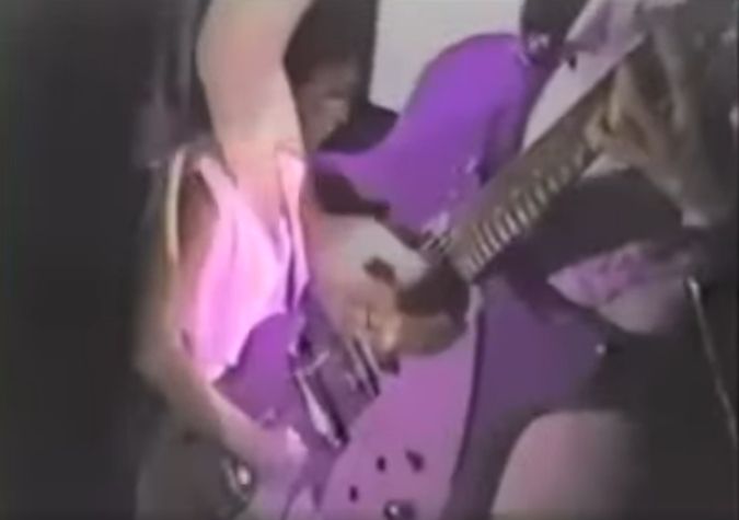 Wendy Melvoin playing guitar on Aug. 3, 1983 at First Avenue in her debut with Prince's band. Taken from film clip posted on FB: https://www.facebook.com/100066308659504/videos/prince-purple-rain-did-you-know-that-most-of-the-recording-of-the-single-purple-/937197743065530/