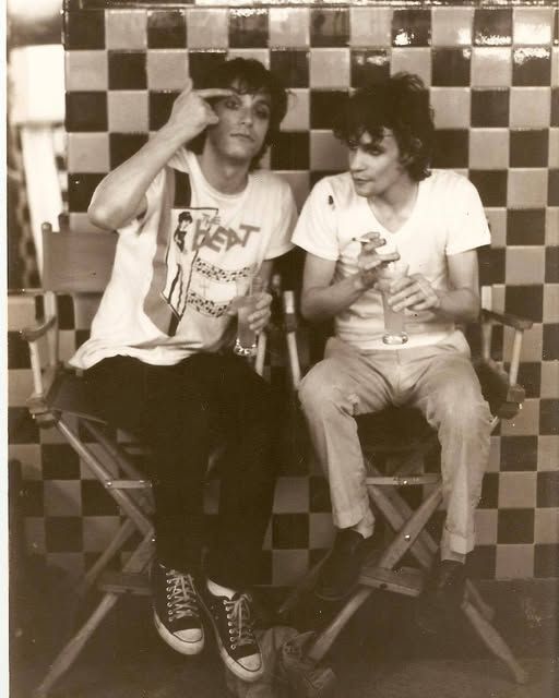Peter Buck and Paul Westerberg out on the town, wearing eyeliner. Buck is in a "The [English] Beat" t-shirt. Photo is August 1983. 

(Photo courtesy of Lynn Blakey)