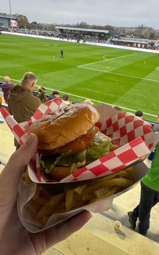chicken burger and chips, pictured in hand from bromley football away stand