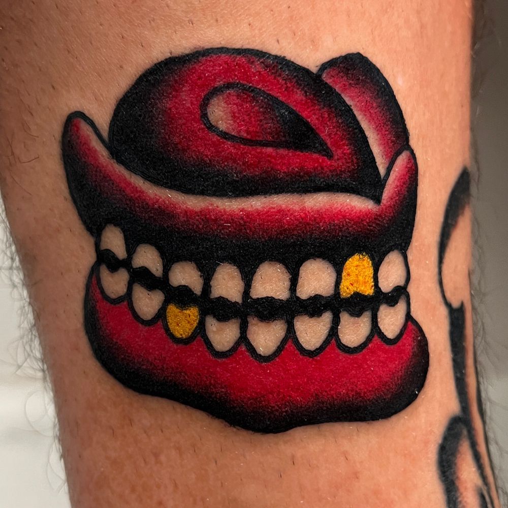 color tattoo of dentures