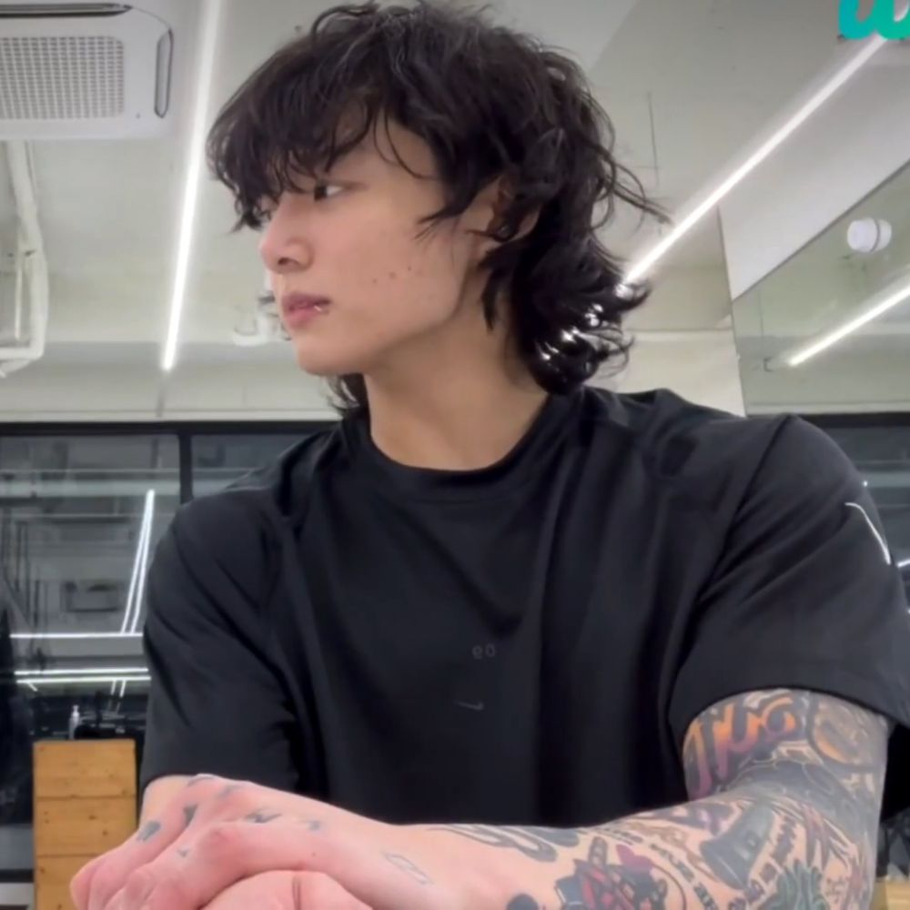 long-haired jungkook in his boxing gym
