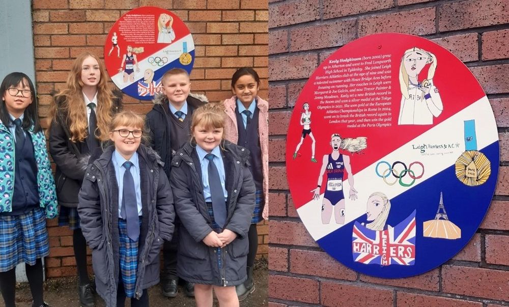 children standing in front of a plaque which includes their drawings of olympic athlete Keely Hodgkinson
