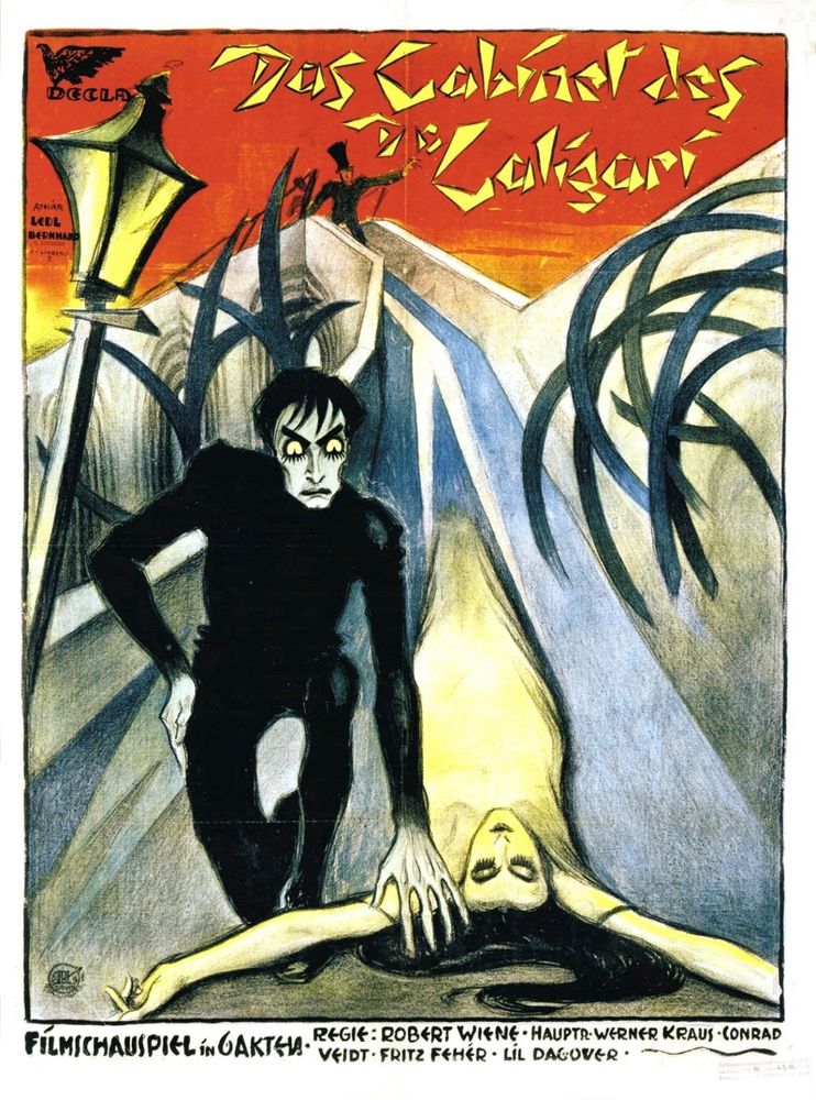 a poster for the German expressionist film “the cabinet of doctor Caligary.” A woman in a white gown is lying on the ground with her arms outstretched, and a man hovers over her with a hand about to touch her shoulder. he has a intense, wide-eyed expression with severe sunken cheekbones.