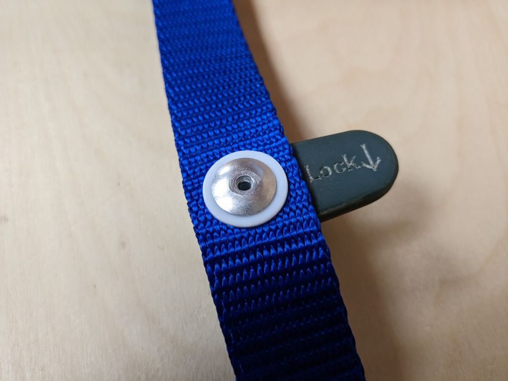 A universal rotating sail slot slider for stabilising a mast ladder on an in-mast furling system.