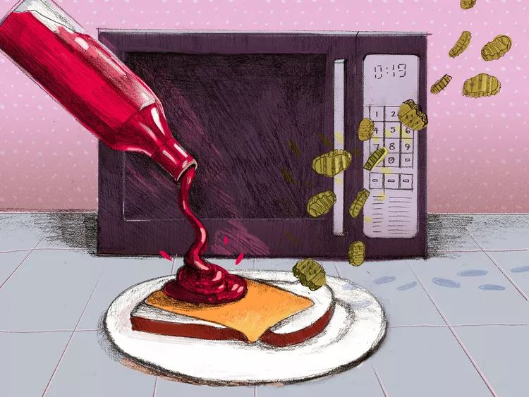 Color illustration: A bottle of red ketchup pours its contents onto an open faced cheese sandwich set on a plate in front of a microwave, as a cascade of airborne pickles descends from the top left corner of the image toward the individual slice of orange cheese.
📸: Annelise Capossela
