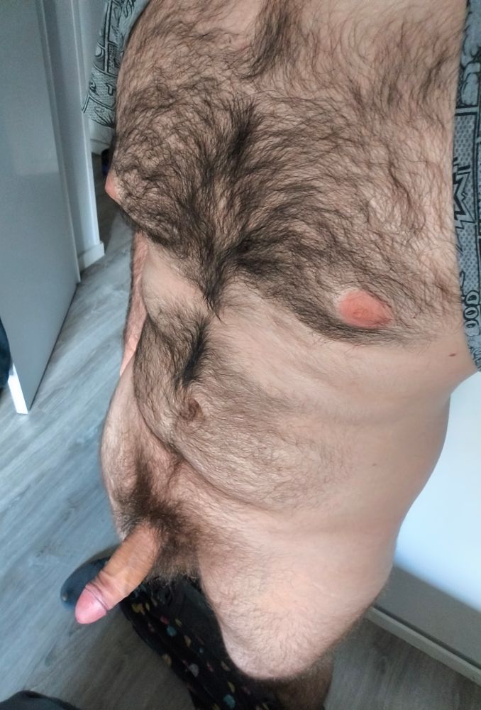 My hairy body and hard cock showing.
