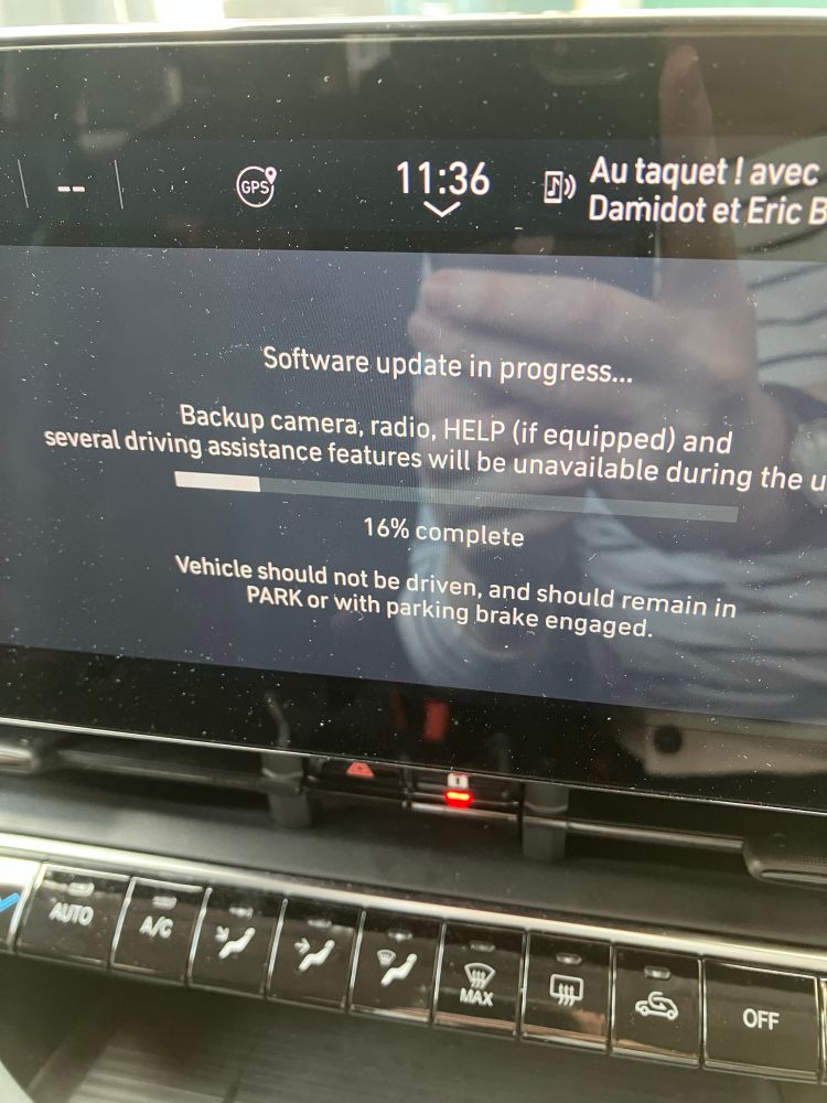A snapshot of the multifunction touchscreen in a Fiat car. The text reads: Software update in progress...
Backup camera, radio, HELP (if equipped) and
several driving assistance features will be unavailable during the u
16% complete
Vehicle should not be driven, and should remain in PARK or with parking brake engaged.