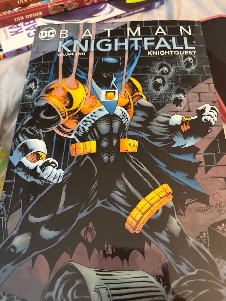 the cover of knightfall volume two. it shows the jean paul valley version of batman, with an over-the-top armored design and excessive weapons