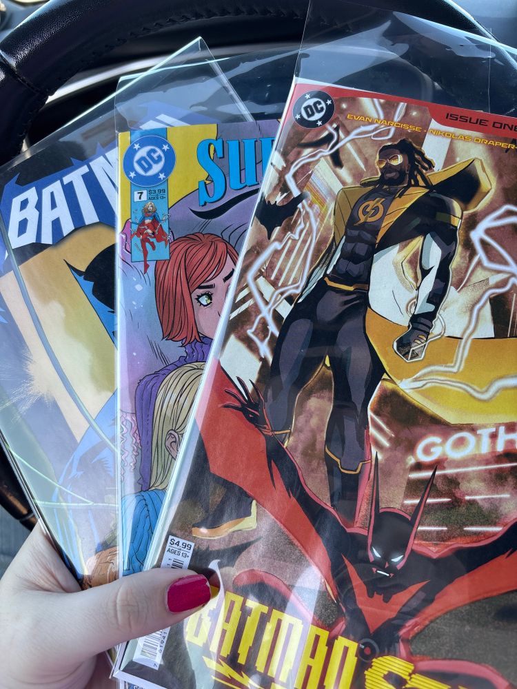 the image shows the covers of batman #3, supergirl #7, batman and static beyond #1
