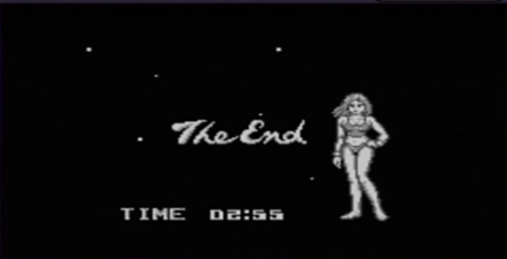 A screenshot from the Gameboy game Metroid II: Return of Samus. The words "The End" and "Time 02:55" appear along with a sprite of de-armored Samus Aran in very tight fitting tank top and bikini underwear. Samus's hand is on her hip and one knee is slightly bent as if to suggest it was no big deal having just killed several dozen Metroids and she would be down to relax now...maybe even with you. 