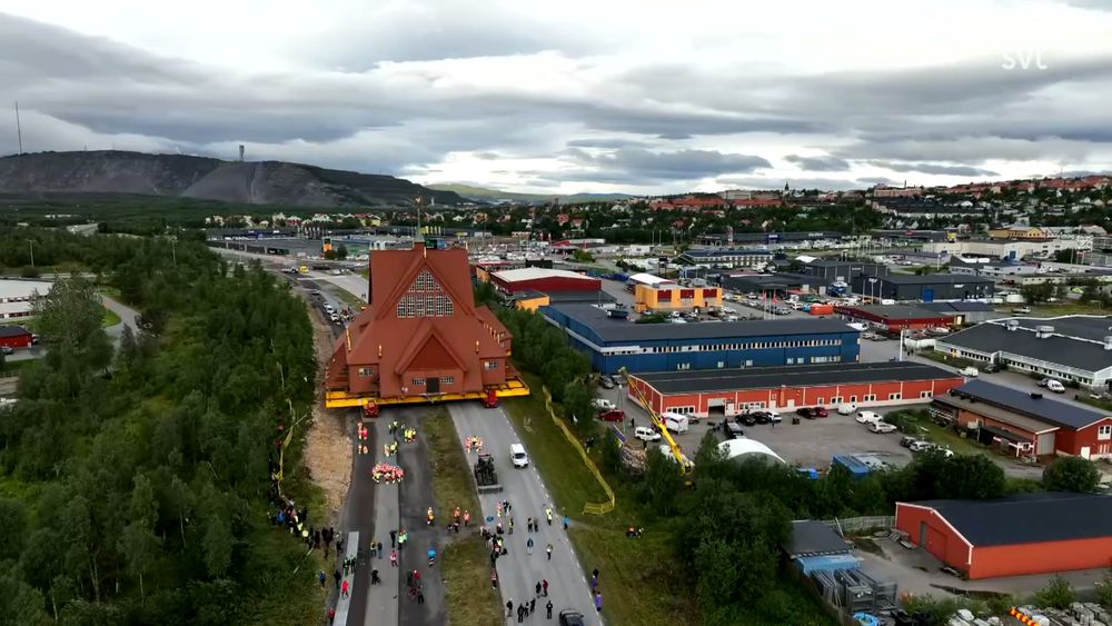 Kiruna church parked outside of Rymdhuset, where it spent the night following the first half of its move along the roads of Kiruna on its way to its new location.