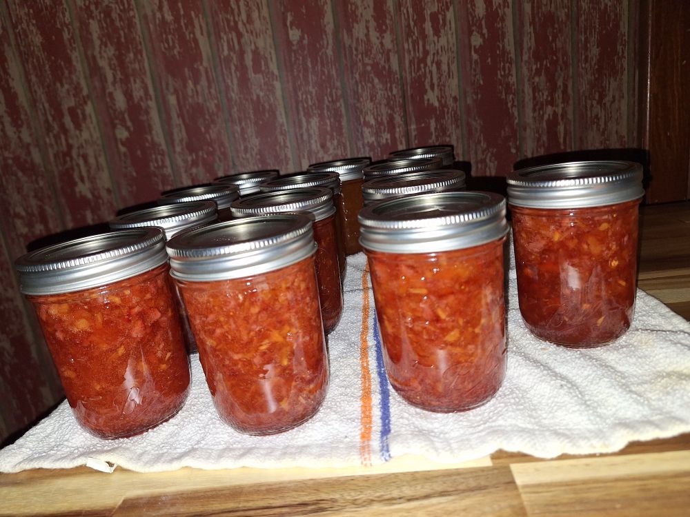 Picture of half pint jars of strawberry peach jam