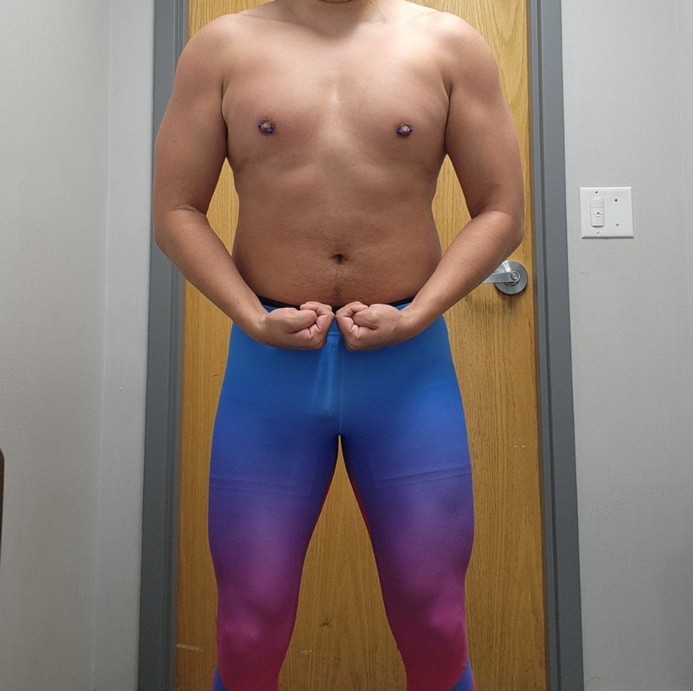 Lycrabeast flexing in the gym bathroom shirtless and in lycra. sporting some led queens tights