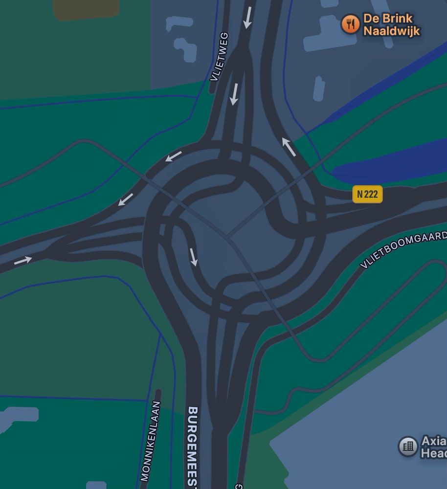 Huge, complex roundabout in western part of the Netherlands near route N222 with essentially a separate road per each direction, with bike lanes crossing under it.