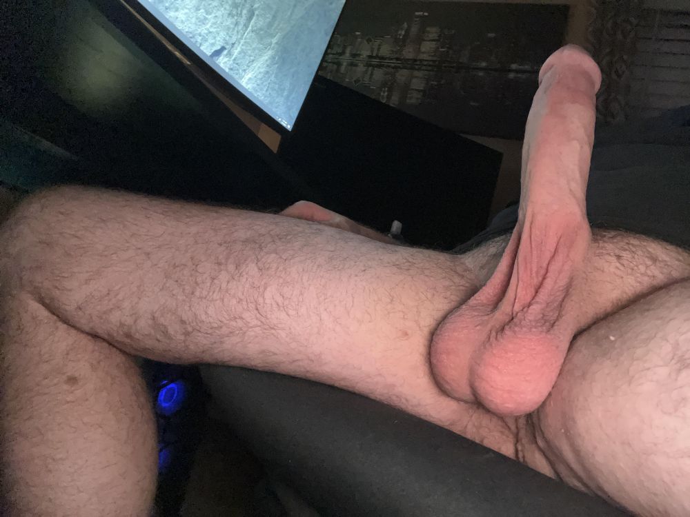 White dick nice big balls sitting in an office chair 