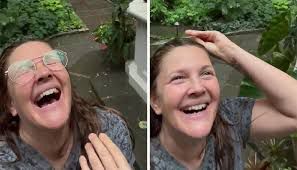 Drew Barrymore enjoying the raining. 