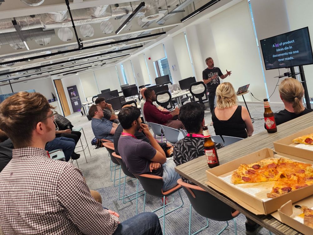 Me talking about prototyping as an alternative to writing product requirements documents in front of an attentive audience of product people (and some pizzas) at ProductTank Newcastle.