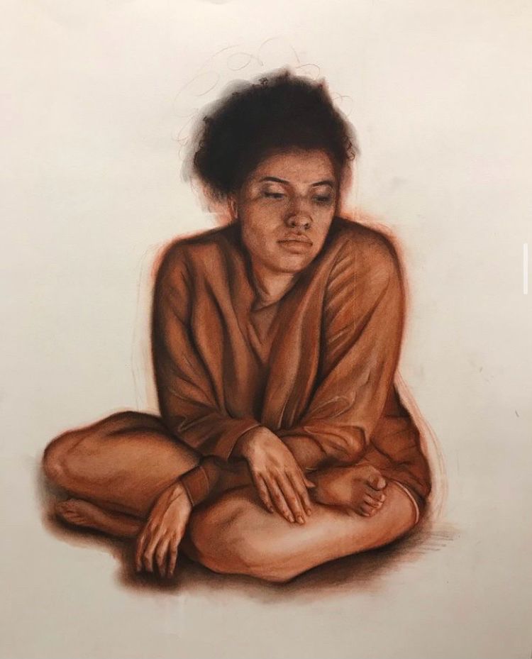 Realistic styled self portrait rendered in black, brown, orange, and white conte crayon.