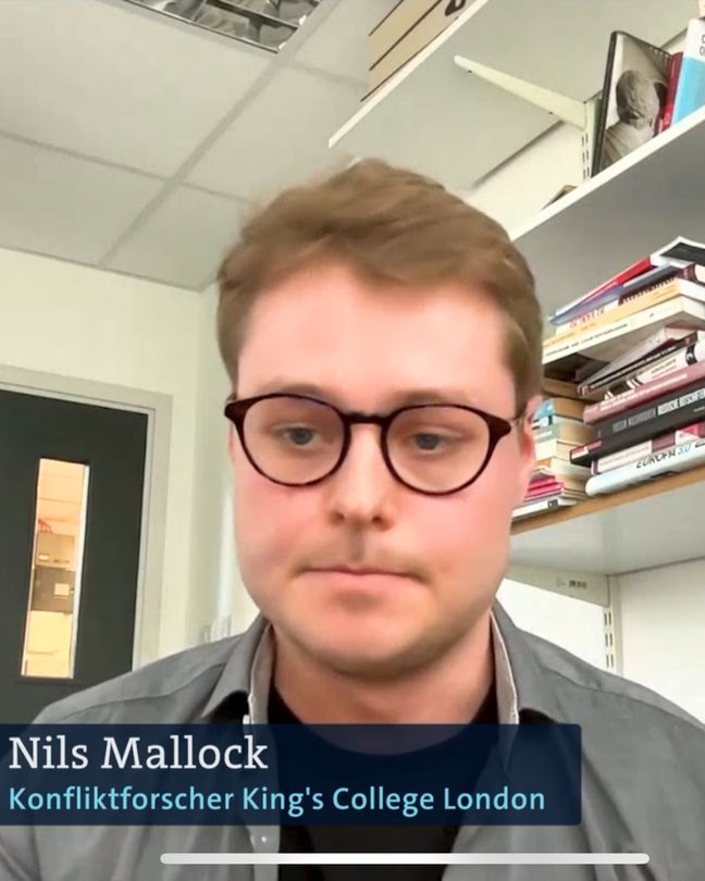 Nils Mallock being interviewed