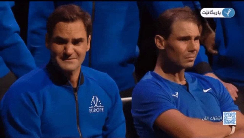 two men wearing blue shirts with europe written on them