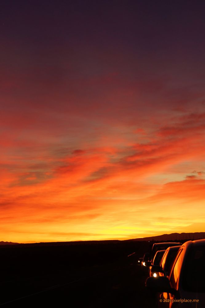 Line of Cars in Oudtshorn with Radiant Sky Shortly Before Sunrise