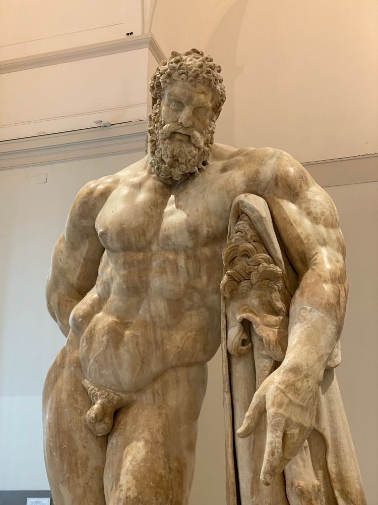 Hercules Farnese, detail of front with Hercules leaning on his club.