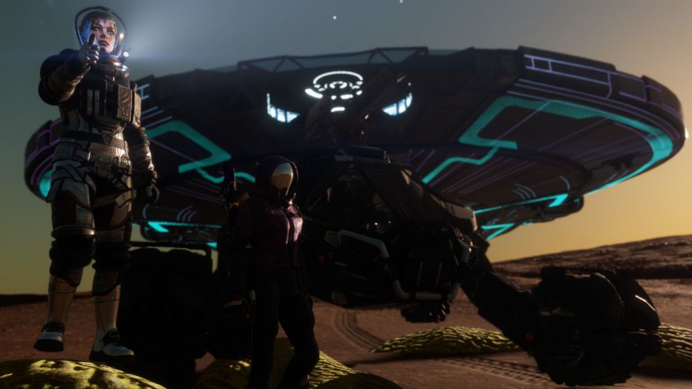 CMDRs Ellen Jameson (left) and PhoenixBlue0 pose for a photo in front of a Scorpion Surface Reconnaissance Vehicle. A Caspian Explorer is also visible in the background. The Scorpion SRV is parked on top of some stratum exobiological lifeforms.